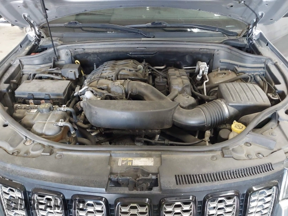 2018 Jeep Grand Cherokee Laredo E with VIN 1C4RJFAG7JC203793, listed as a IAAI auction lot 42585072 with 263,987 mi miles and . Bid and sale history available at DreamBid. Image 10.