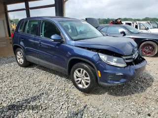2013 Volkswagen Tiguan S with VIN WVGAV3AX6DW621714, listed as a Copart auction lot 54730565 with 121,257 mi miles and Salvage title. Bid and sale history available at DreamBid. Image 4.