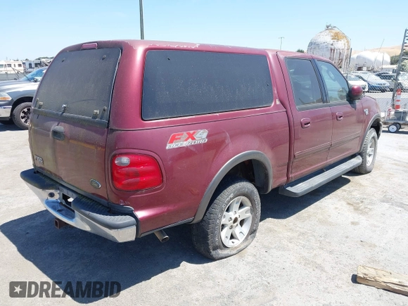2003 Ford F-150 XLT with VIN 1FTRW08L63KA20475, listed as a IAAI auction lot 42610305 with Not provided miles and . Bid and sale history available at DreamBid. Image 4.