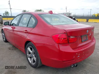 2013 BMW 3 Series 328i with VIN WBA3A5C51DF353779, listed as a IAAI auction lot 42036730 with 133,674 mi miles. Bid and sale history available at carsss.com. Image 3.