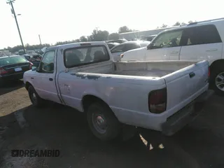 1997 Ford Ranger XLT with VIN 1FTCR10AXVTA71889, listed as a IAAI auction lot 42601700 with 123,167 mi miles and . Bid and sale history available at DreamBid. Image 3.