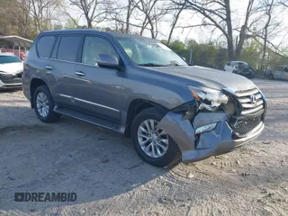 2014 Lexus GX 460 with VIN JTJBM7FX9E5065477, listed as a IAAI auction lot 41891048 with 245,156 mi miles. Bid and sale history available at carsss.com. Image 1.