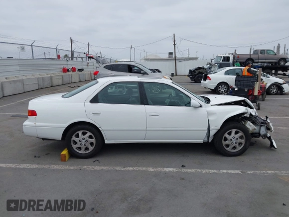 2000 Toyota Camry LE z VIN JT2BF28K3Y0289145, wystawiony jako IAAI lot #42455085 z przebiegiem 202 809 mil mil oraz . Historia ofert i sprzedaży dostępna na DreamBid. Obrazek 13.