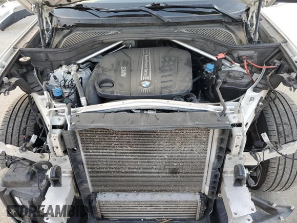 2014 BMW X5 xDrive35d z VIN 5UXKS4C53E0C07301, wystawiony jako Copart lot #54429095 z przebiegiem 106 050 mil mil oraz Szkoda całkowita • Salvage title. Historia ofert i sprzedaży dostępna na DreamBid. Obrazek 11.