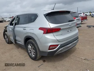 2019 Hyundai Santa Fe SE z VIN 5NMS23AD4KH046066, wystawiony jako IAAI lot #41880900 z przebiegiem 45 220 mil mil oraz . Historia ofert i sprzedaży dostępna na DreamBid. Obrazek 3.