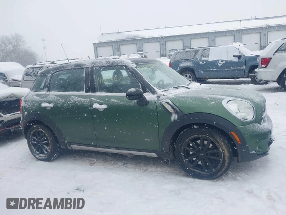 2015 MINI Countryman S z VIN WMWZC5C59FWP48946, wystawiony jako IAAI lot #41298127 z przebiegiem 106 293 mil mil oraz . Historia ofert i sprzedaży dostępna na DreamBid. Obrazek 13.