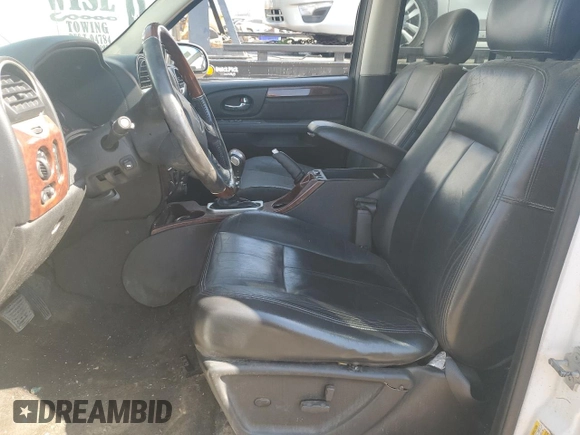 2006 GMC Envoy Denali with VIN 1GKET63M062277442, listed as a Copart auction lot 59787724 with 231,882 mi miles and Salvage Title. Bid and sale history available at carsss.com. Image 7.