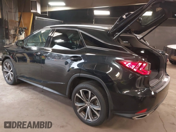 2021 Lexus RX with VIN 2T2HZMDA2MC279445, listed as a IAAI auction lot 41913178 with 38,598 mi miles. Bid and sale history available at carsss.com. Image 3.