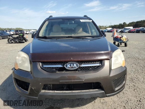 2009 Kia Sportage LX with VIN KNDJF724297573255, listed as a Copart auction lot 51300095 with 199,362 mi miles and Salvage Title. Bid and sale history available at carsss.com. Image 5.