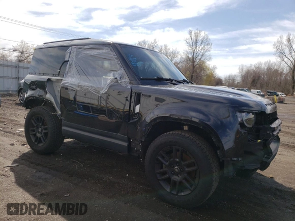 2023 Land Rover Defender S with VIN SALEJ6EX0P2173858, listed as a Copart auction lot 52773365 with 30,768 mi miles and Salvage title. Bid and sale history available at DreamBid. Image 4.