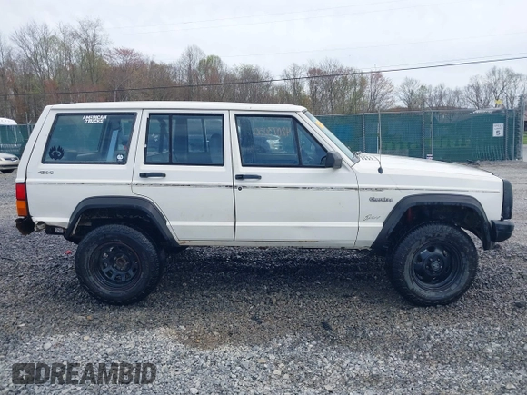 1996 Jeep Cherokee SE with VIN 1J4FJ28S3TL241251, listed as a IAAI auction lot 42073050 with 156,523 mi miles and . Bid and sale history available at DreamBid. Image 13.