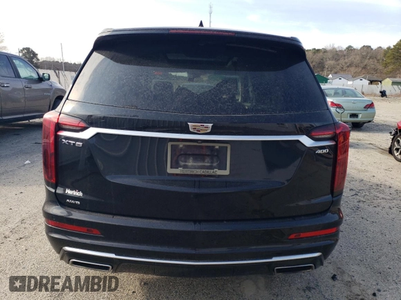 2020 Cadillac XT6 AWD Premium Luxury z VIN 1GYKPDRS6LZ154335, wystawiony jako Copart lot #45735405 z przebiegiem 100 584 mil mil oraz Szkoda całkowita • Salvage title. Historia ofert i sprzedaży dostępna na DreamBid. Obrazek 6.