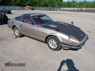 1983 Datsun 280ZX z VIN JN1HZ04S9DX573578, wystawiony jako IAAI lot #42516151 z przebiegiem 135 572 mil mil oraz . Historia ofert i sprzedaży dostępna na DreamBid. Obrazek 1.