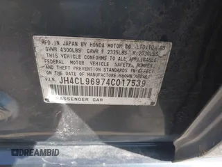 2004 Acura TSX w/Navigation with VIN JH4CL96974C017539, listed as a IAAI auction lot 41918507 with 168,557 mi miles. Bid and sale history available at carsss.com. Image 9.