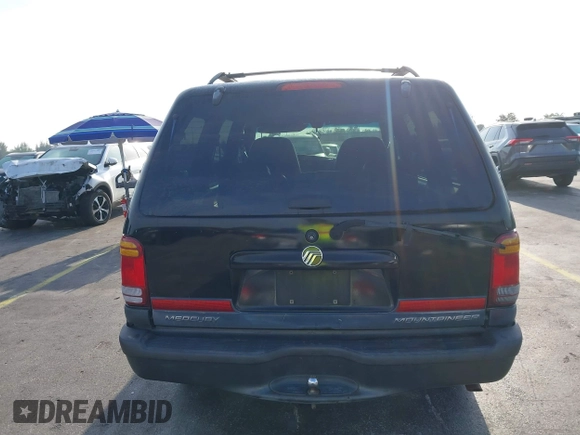 1999 Mercury Mountaineer z VIN 4M2ZU52P9XUJ11372, wystawiony jako IAAI lot #41849011 z przebiegiem 286 379 mil mil oraz . Historia ofert i sprzedaży dostępna na DreamBid. Obrazek 16.