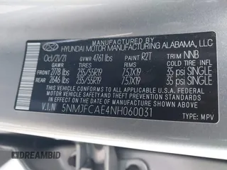 2022 Hyundai Tucson SEL with VIN 5NMJFCAE4NH060031, listed as a IAAI auction lot 41451874 with 57,228 mi miles and . Bid and sale history available at carsss.com. Image 9.