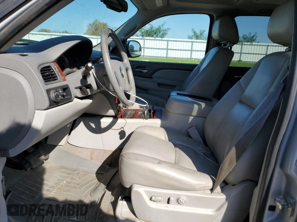 2013 Chevrolet Suburban LTZ with VIN 1GNSCKE0XDR363158, listed as a Copart auction lot 73305534 with 167,841 mi miles and Clean Title. Bid and sale history available at carsss.com. Image 7.