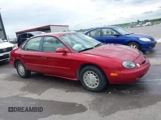 1996 Ford Taurus LX with VIN 1FALP53S2TA221249, listed as a IAAI auction lot 42506786 with 198,272 mi miles and . Bid and sale history available at DreamBid. Image 13.