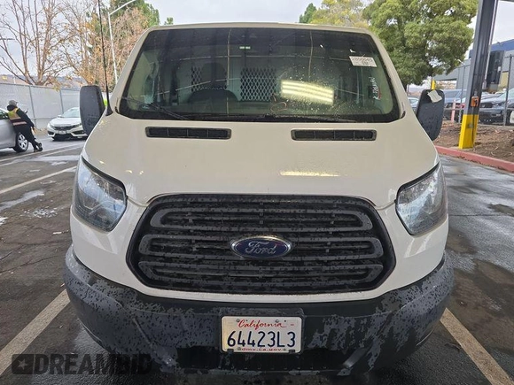 2016 Ford Transit Cargo z VIN 1FTYE1YM9GKB18600, wystawiony jako IAAI lot #42726792 z przebiegiem 127 434 mil mil oraz . Historia ofert i sprzedaży dostępna na DreamBid. Obrazek 28.