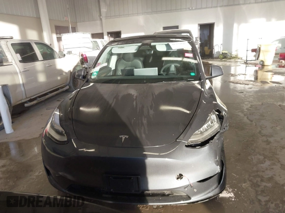 2023 Tesla Model Y Long Range with VIN 7SAYGDEE5PA033341, listed as a IAAI auction lot 41379625 with Not provided miles and . Bid and sale history available at DreamBid. Image 12.