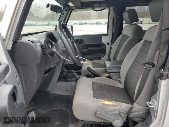 2010 Jeep Wrangler Sport with VIN 1J4AA2D1XAL227397, listed as a Copart auction lot 54003555 with 158,026 mi miles and Clean Title. Bid and sale history available at carsss.com. Image 7.