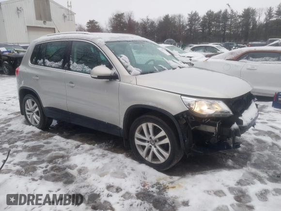 2011 Volkswagen Tiguan SE with VIN WVGBV7AX2BW513647, listed as a IAAI auction lot 41660772 with 86,042 mi miles and . Bid and sale history available at DreamBid. Image 1.