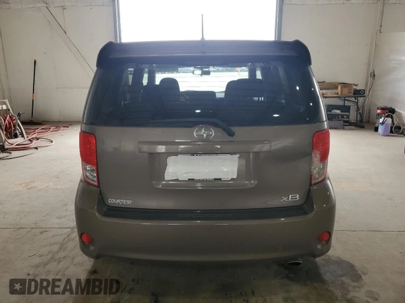 2012 Scion xB z VIN JTLZE4FE6C1145727, wystawiony jako Copart lot #54135915 z przebiegiem 111 652 mil mil oraz Szkody całkowita. Historia ofert i sprzedaży dostępna na DreamBid. Obrazek 6.