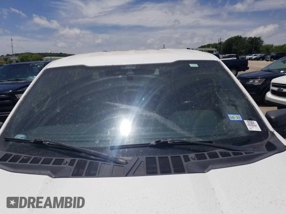 2021 Ford F-150 XL with VIN 1FTFW1E58MKE56244, listed as a IAAI auction lot 42610386 with 169,731 mi miles and . Bid and sale history available at DreamBid. Image 1.