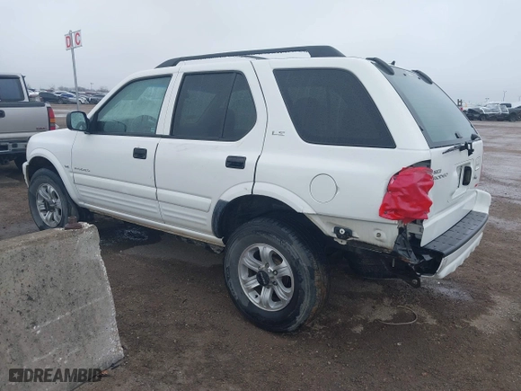2001 Isuzu Rodeo S with VIN 4S2DM58WX14315138, listed as a IAAI auction lot 41535619 with 217,960 mi miles. Bid and sale history available at carsss.com. Image 3.