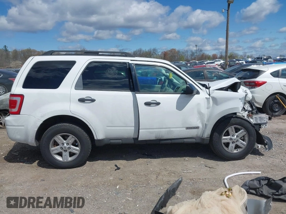 2008 Ford Escape Hybrid with VIN 1FMCU59H48KC09874, listed as a IAAI auction lot 42040477 with 85,839 mi miles and . Bid and sale history available at DreamBid. Image 13.