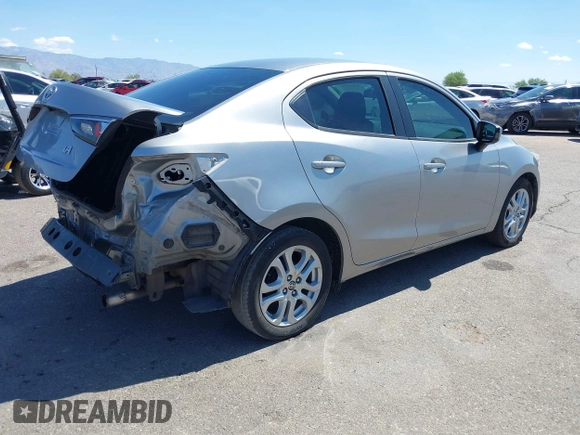 2016 Scion iA z VIN 3MYDLBZV1GY132561, wystawiony jako IAAI lot #42425947 z przebiegiem 94 882 mil mil oraz . Historia ofert i sprzedaży dostępna na DreamBid. Obrazek 4.