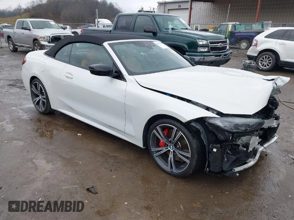 2023 BMW 4 Series M440i xDrive with VIN WBA63AT04PCL70876, listed as a IAAI auction lot 40777902 with 21,944 mi miles. Bid and sale history available at carsss.com. Image 1.