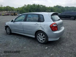 2005 Kia Spectra z VIN KNAFE162755170129, wystawiony jako Copart lot #60217065 z przebiegiem 94 458 mil mil oraz Szkoda całkowita • Salvage title. Historia ofert i sprzedaży dostępna na DreamBid. Obrazek 2.