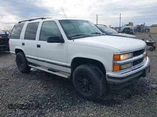 1997 Chevrolet Tahoe z VIN 1GNEK13R7VJ324524, wystawiony jako IAAI lot #41623104 z przebiegiem 268 178 mil mil oraz . Historia ofert i sprzedaży dostępna na DreamBid. Obrazek 1.