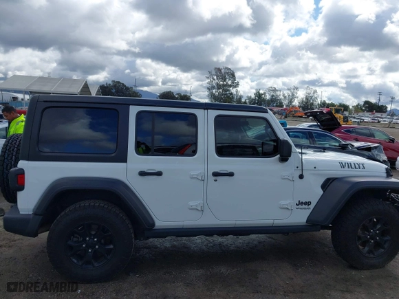 2020 Jeep Wrangler Unlimited Sport Altitude with VIN 1C4HJXDG9LW315977, listed as a IAAI auction lot 41788892 with 60,380 mi miles. Bid and sale history available at carsss.com. Image 14.