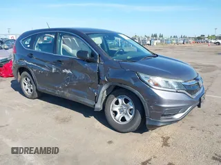 2015 Honda CR-V LX with VIN 3CZRM3H31FG709059, listed as a IAAI auction lot 42131551 with 98,738 mi miles and . Bid and sale history available at carsss.com. Image 1.