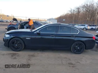 2013 BMW 5 Series 528i xDrive with VIN WBAXH5C58DD107515, listed as a IAAI auction lot 41673214 with 115,726 mi miles. Bid and sale history available at carsss.com. Image 14.