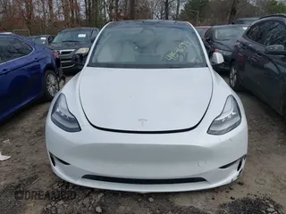 2023 Tesla Model Y Long Range with VIN 7SAYGDEE2PA145398, listed as a IAAI auction lot 41546573 with 20,812 mi miles and . Bid and sale history available at carsss.com. Image 11.