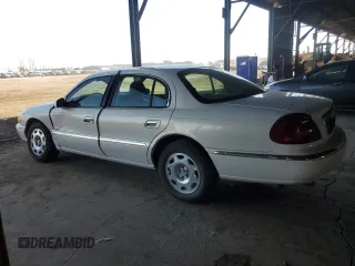 2001 Lincoln Continental with VIN 1LNHM97V31Y622782, listed as a Copart auction lot 74023344 with 116,672 mi miles and Salvage Title. Bid and sale history available at carsss.com. Image 2.