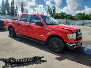 2014 Ford F-150 XL with VIN 1FTFW1CT3EFC74625, listed as a Copart auction lot 62128225 with 223,803 mi miles and Salvage title. Bid and sale history available at DreamBid. Image 4.