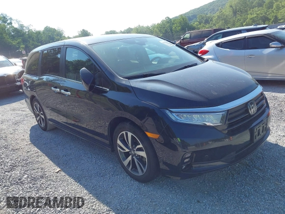 2021 Honda Odyssey Touring with VIN 5FNRL6H84MB027396, listed as a IAAI auction lot 42616650 with 67,207 mi miles and . Bid and sale history available at DreamBid. Image 1.