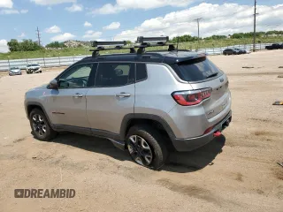 2017 Jeep Compass Trailhawk with VIN 3C4NJDDB1HT646751, listed as a Copart auction lot 62583555 with 99,974 mi miles and Salvage title. Bid and sale history available at DreamBid. Image 2.