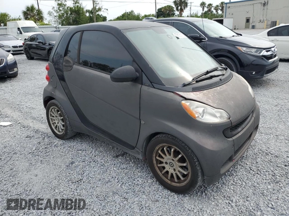 2012 Smart fortwo Pure with VIN WMEEJ3BA2CK519118, listed as a Copart auction lot 57813115 with 127,472 mi miles and Clean title. Bid and sale history available at DreamBid. Image 4.