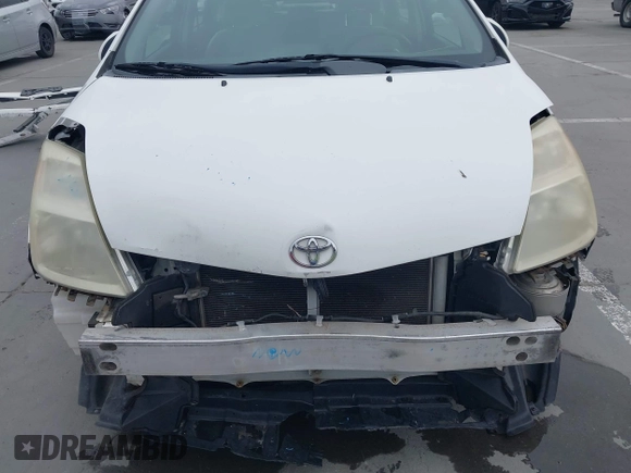 2004 Toyota Prius with VIN JTDKB22U640049837, listed as a IAAI auction lot 42033704 with 160,028 mi miles and . Bid and sale history available at DreamBid. Image 6.
