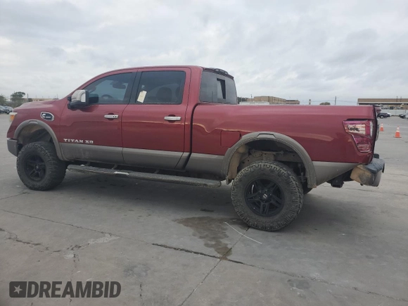 2016 Nissan Titan XD PRO-4X with VIN 1N6BA1F45GN500008, listed as a Copart auction lot 77282724 with 119,868 mi miles and Clean Title. Bid and sale history available at carsss.com. Image 2.