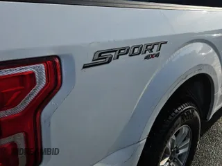 2018 Ford F-150 XL with VIN 1FTEX1EP2JFD30637, listed as a IAAI auction lot 42127555 with 159,367 mi miles. Bid and sale history available at carsss.com. Image 1.