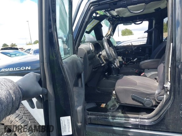 2014 Jeep Wrangler Unlimited Rubicon with VIN 1C4BJWFGXEL172622, listed as a IAAI auction lot 41782796 with 67,594 mi miles. Bid and sale history available at carsss.com. Image 5.