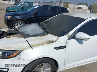 2015 Kia Optima LX with VIN 5XXGM4A78FG464232, listed as a IAAI auction lot 42097937 with Not Provided miles and . Bid and sale history available at DreamBid. Image 14.