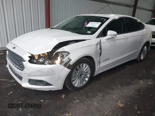 2013 Ford Fusion SE Hybrid with VIN 3FA6P0LU1DR357428, listed as a IAAI auction lot 41153491 with 153,738 mi miles. Bid and sale history available at carsss.com. Image 2.