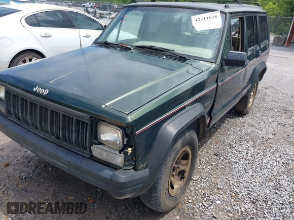 1996 Jeep Cherokee Sport with VIN 1J4FT68S6TL269966, listed as a IAAI auction lot 42211628 with 212,944 mi miles and . Bid and sale history available at DreamBid. Image 6.